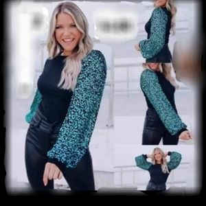 Long sleeve sequin blouse, size L, Black color with blue sequined sleeves